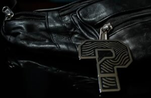 ZipDrip Zipper Pull on a black leather jacket zipper