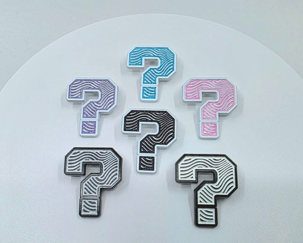 Collection of custom enamel ZipDrip Zipper Pulls in different colors